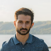 Man in blue polo outdoors